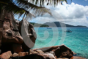 Deserted island landscape with crystal water photo