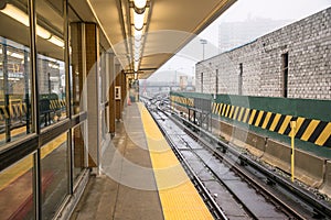 Empty platform of an overground metro station photo