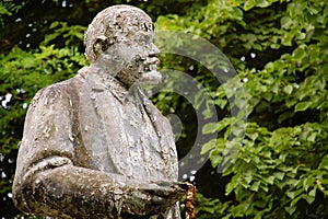 Deserted, shabby and flaky Lenin's statue