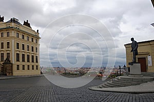 Deserted Square with Statue of Tomas Garrigue Masaryk in front of Prague Castle during Coronavirus Lock-down, Europe