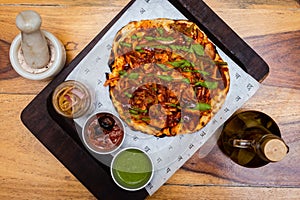 A desi kulcha with topings