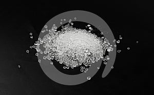 Desiccant Silica Gel Adsorbent Crystals on Black Background, Desiccant Polymer Balls