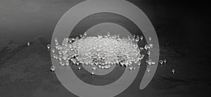 Desiccant Silica Gel Adsorbent Crystals on Black Background, Desiccant Polymer Balls