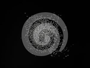 Desiccant Silica Gel Adsorbent Crystals on Black Background, Desiccant Polymer Balls