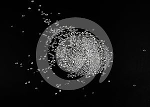 Desiccant Silica Gel Adsorbent Crystals on Black Background, Desiccant Polymer Balls