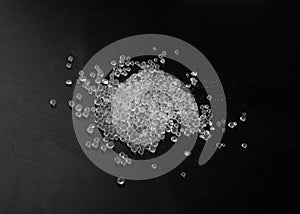 Desiccant Silica Gel Adsorbent Crystals on Black Background, Desiccant Polymer Balls