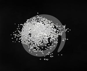 Desiccant Silica Gel Adsorbent Crystals on Black Background, Desiccant Polymer Balls photo
