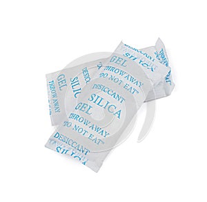 Desiccant Silica Gel Adsorbent Sachet Isolated, Desiccant Polymer Bag, Silicagel, Clipping Path photo