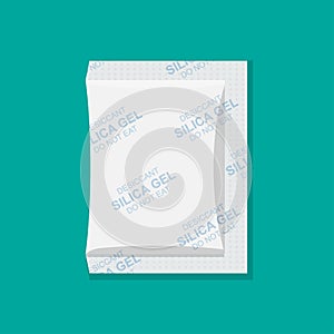 Desiccant silica gel in white paper package isolated on background