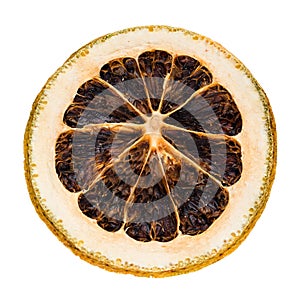 Desiccated citrus slice on white background