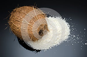 Desiccated coconut and whole coconut photo