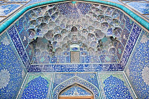 Design of the beautiful tiled symmetrical patternes of Mosque in Iran.