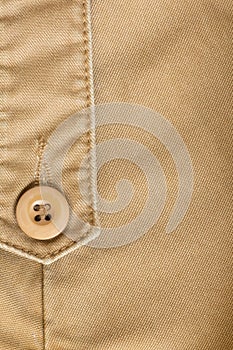 Design botton of brown shirt on fabric textile
