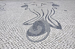 Design of the cobblestone paving front of Oceanarium building from Parque das Nacoes or Park of the Nations area in Lisbon