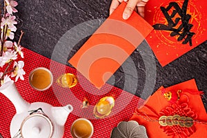 Design concept of Chinese lunar January new year - Woman holding, giving red envelopes ang pow, hong bao for lucky money, top