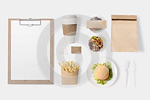 Design concept of mockup burger, salad, coffee cup, french fries
