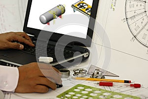 Design Engineer at Work on a Computer photo