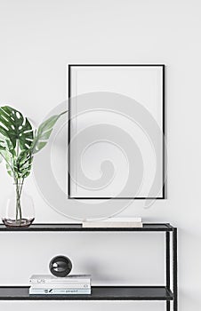 Design modern interior of living room with black metal console, green leaves in vase, mock up poster frame