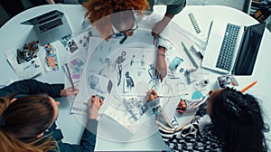 Design professionals collaborating and innovating on a project in a creative workspace. AIG53M