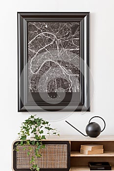 Design scandi home interior of the living room with wooden commode and black poster frame. White walls in nice and cosy apartment.