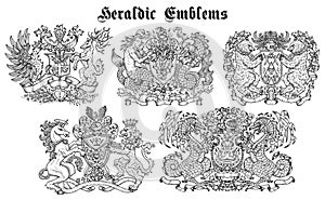 Design set with heraldic emblems and fairy creatures isolated on white