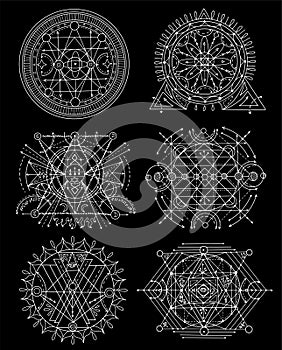 Design set with sacred geometry elements, shapes and patterns isolated on black.