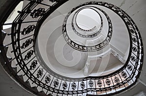 Design spiral staircase inside an old building, circular architectural shape. Spiral stairs.