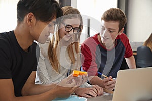 Design Students Working In CAD/3D Printing Lab Together photo