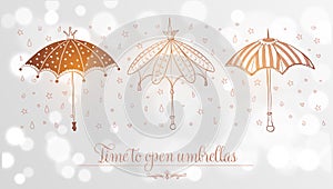 Design template with vintage doodle umbrellas on white glowing background with place for your text. Vector sketch