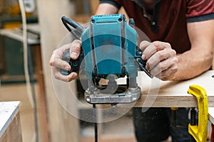 Design wood concept. Cropped photo of cabinetmaker craftsman han