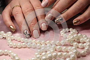 Design of youth manicure with pearls
