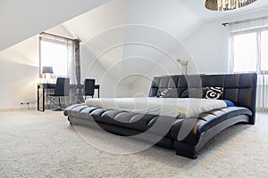 Designed bed in modern bedroom