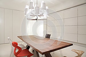 Designed chandelier in dining room