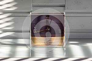 Designed clock on a sideboard