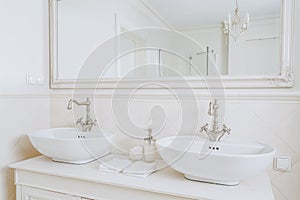 Designed washbasins in retro bathroom photo