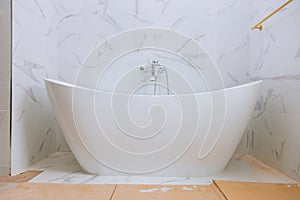 Designer bathroom with bath tub shower