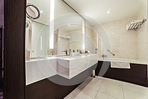 Designer bathroom with shower tiling