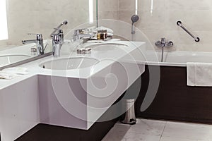 Designer bathroom with shower tiling