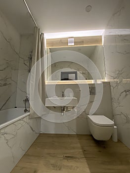 Designer bathroom in white style with a mirror