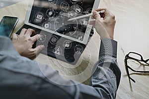 Designer Businessman hand using smart phone,mobile payments online shopping,omni channel,digital tablet docking keyboard computer