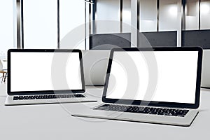 Designer desktop with two laptop
