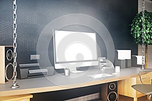 Designer desktop with white laptop