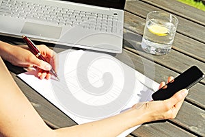 Designer drawing a wireframe for mobile web application