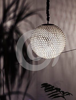 Designer hanging lamp made with thousands of mirrors