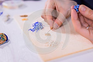 Designer making handmade eardrop