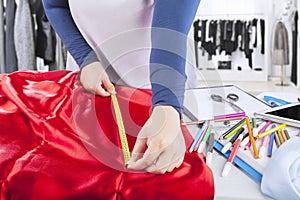 Designer measuring textile material