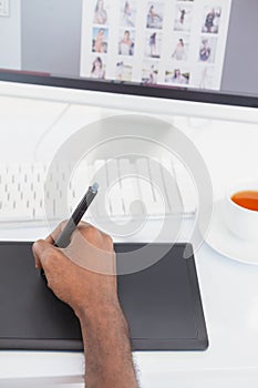 Designer using digitizer and computer