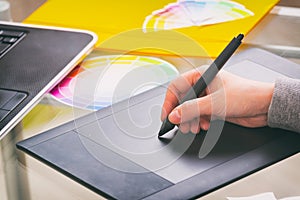 Designer using graphics tablet