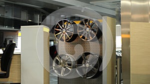 Designer Wheel Rims On The Rack In Automobile Service Center