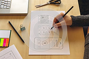 Designer wireframing a mobile App